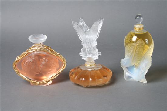 Appraisal: A Group of Three Lalique Perfume Bottles Height of tallest