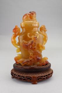 Appraisal: Twin Handled Chinese Carved Amber Vase on Stand Figural Twin