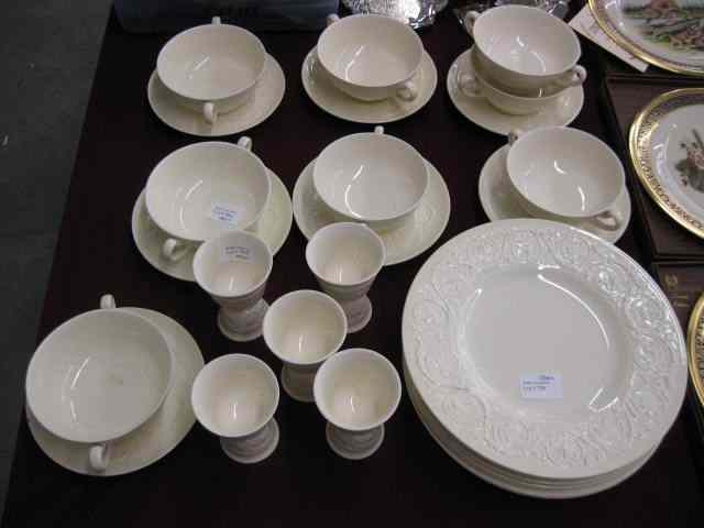 Appraisal: pcs Wedgwood Embossed Queensware ivory includes dinner plates cream soups