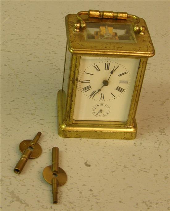 Appraisal: Early th century brass and glass carriage clockwith subsidiary second