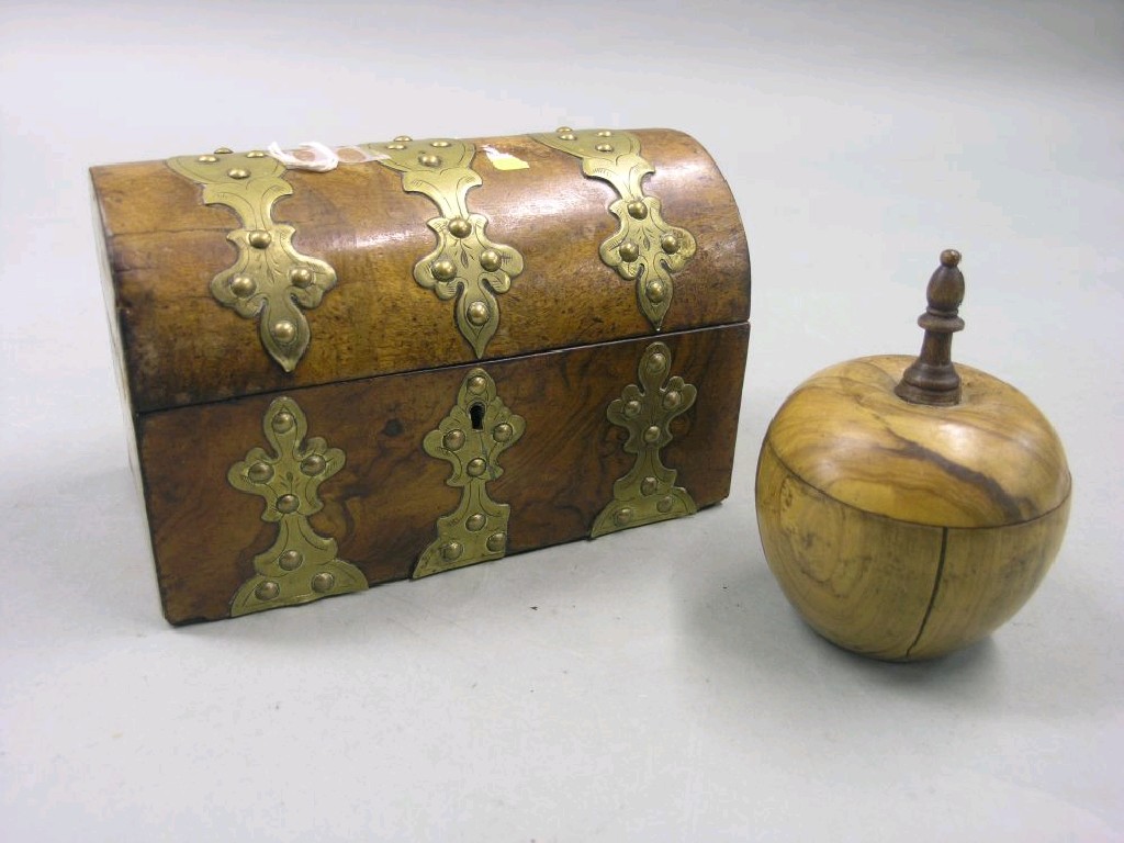 Appraisal: A Victorian burr walnut casket with engraved brass mounts in