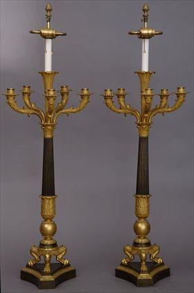 Appraisal: PAIR OF EMPIRE-STYLE SIX-LIGHT CANDELABRA MOUNTED AS LAMPS Each reeded