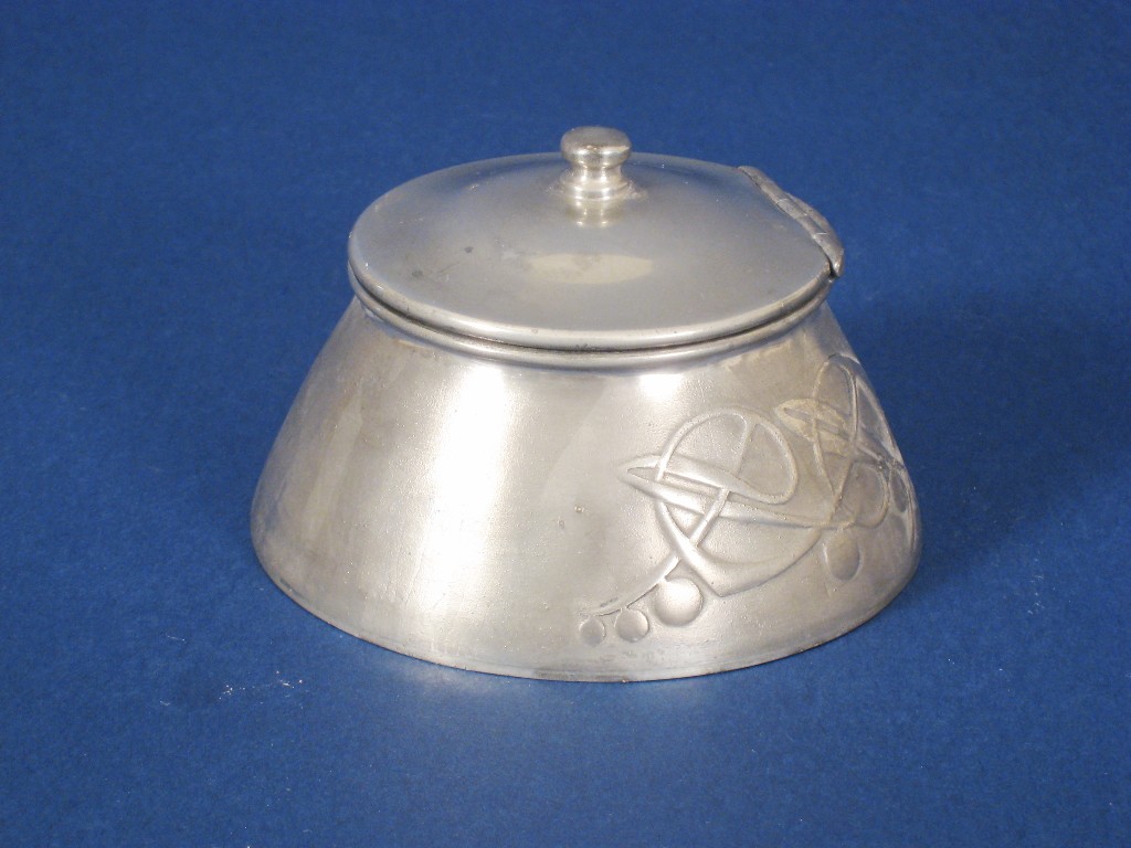 Appraisal: A Liberty pewter circular Inkwell with hinged lid and sinuous