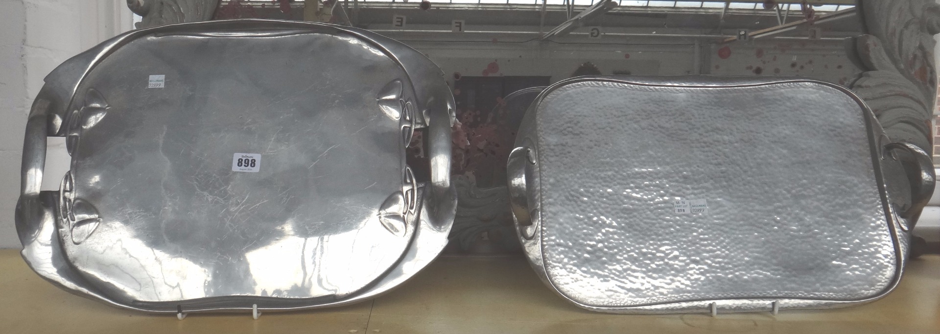 Appraisal: Two Tudric pewter trays circa one decorated with a stylised