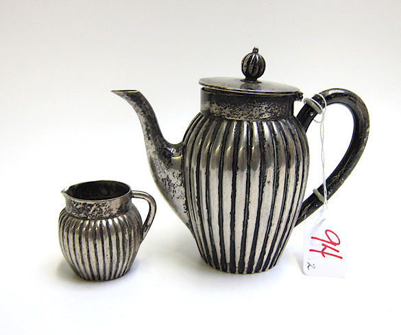 Appraisal: GERMAN FINE SILVER COFFEE POT AND CREAMER SET two pieces