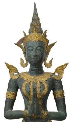 Appraisal: Thai gilt and verde patinated bronze Buddhist figure Thephanom kneeling