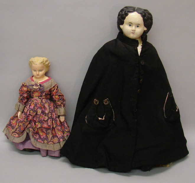 Appraisal: Pair of marked papier mache dolls Unbreakable Heads blonde doll