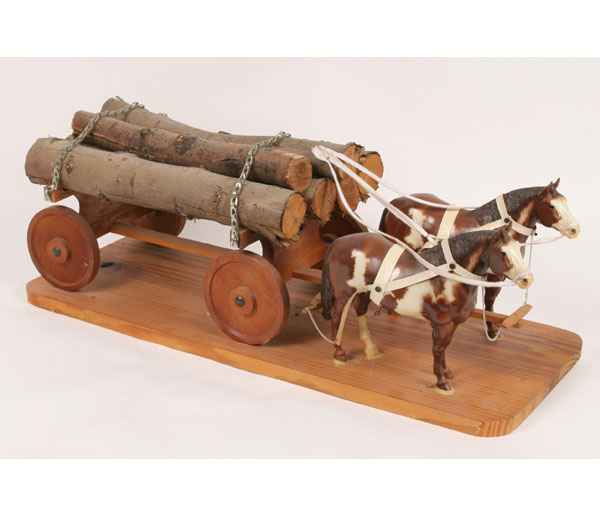 Appraisal: Breyer two horse hitch log wagon matching tobiano paint horses