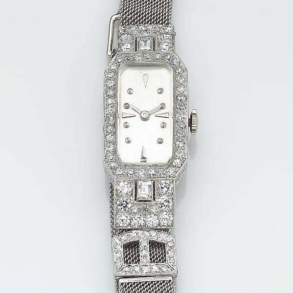 Appraisal: A lady's diamond and platinum wristwatch with mesh band Swiss