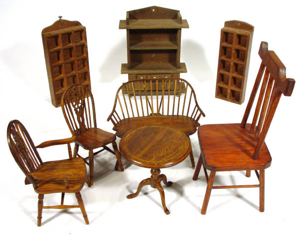 Appraisal: Group of wooden dolls house furniture including two wheel-back Windsor