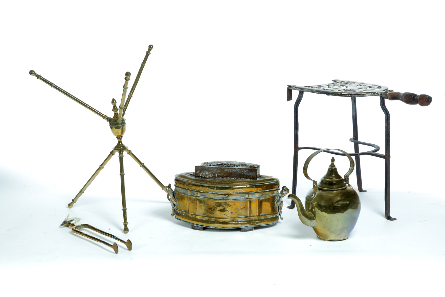 Appraisal: FIVE BRASS ITEMS INCLUDING FOOT WARMER TEAPOT AND EMBER TONGS