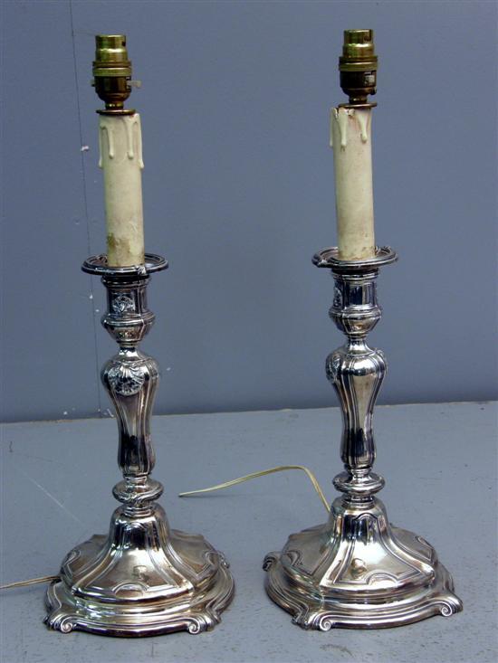 Appraisal: Pair of silver plated candle sticks knopped stems on round