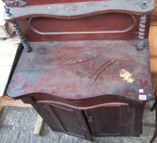 Appraisal: A Victorian mahogany chiffonier the ledge back over a single