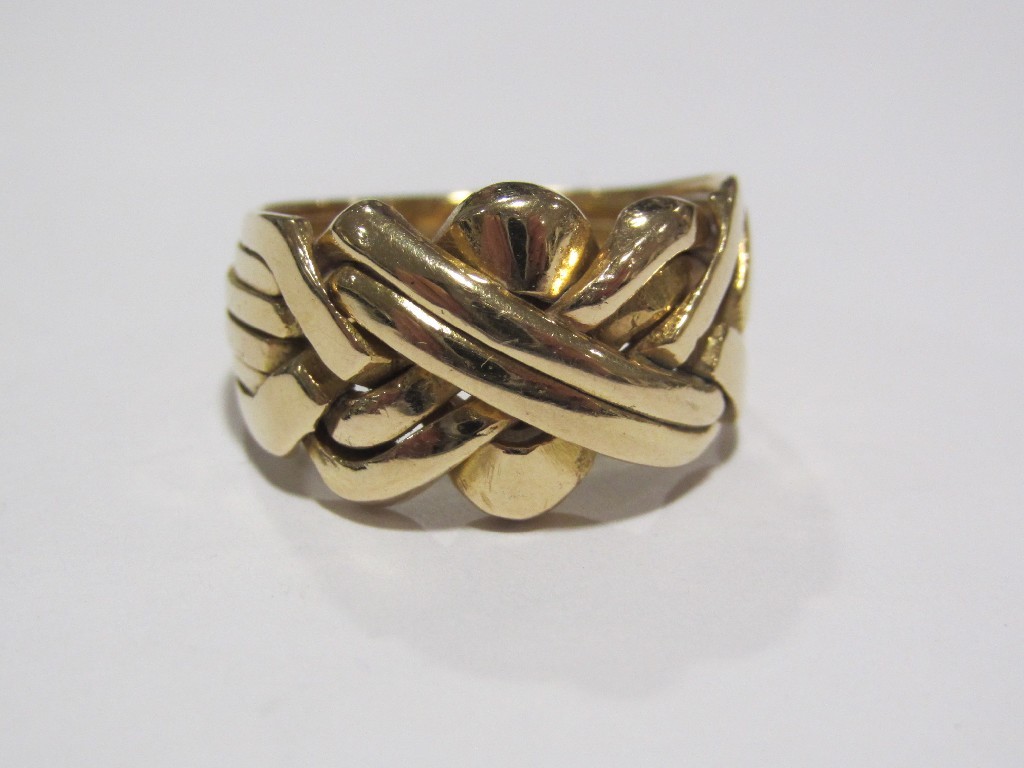 Appraisal: Yellow metal knotwork ring