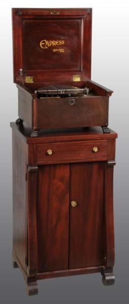 Appraisal: Mira Table Top Disc Music Changer Description Mahogany double comb