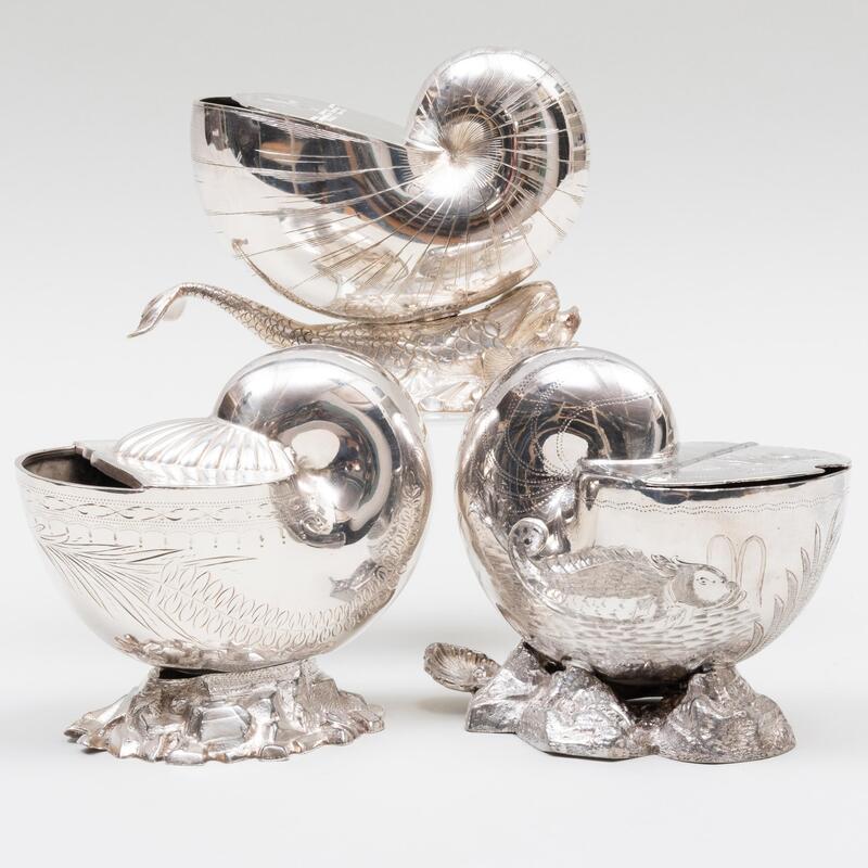 Appraisal: Group of Three Silver Plate Shell Form Spoon Warmers Comprising