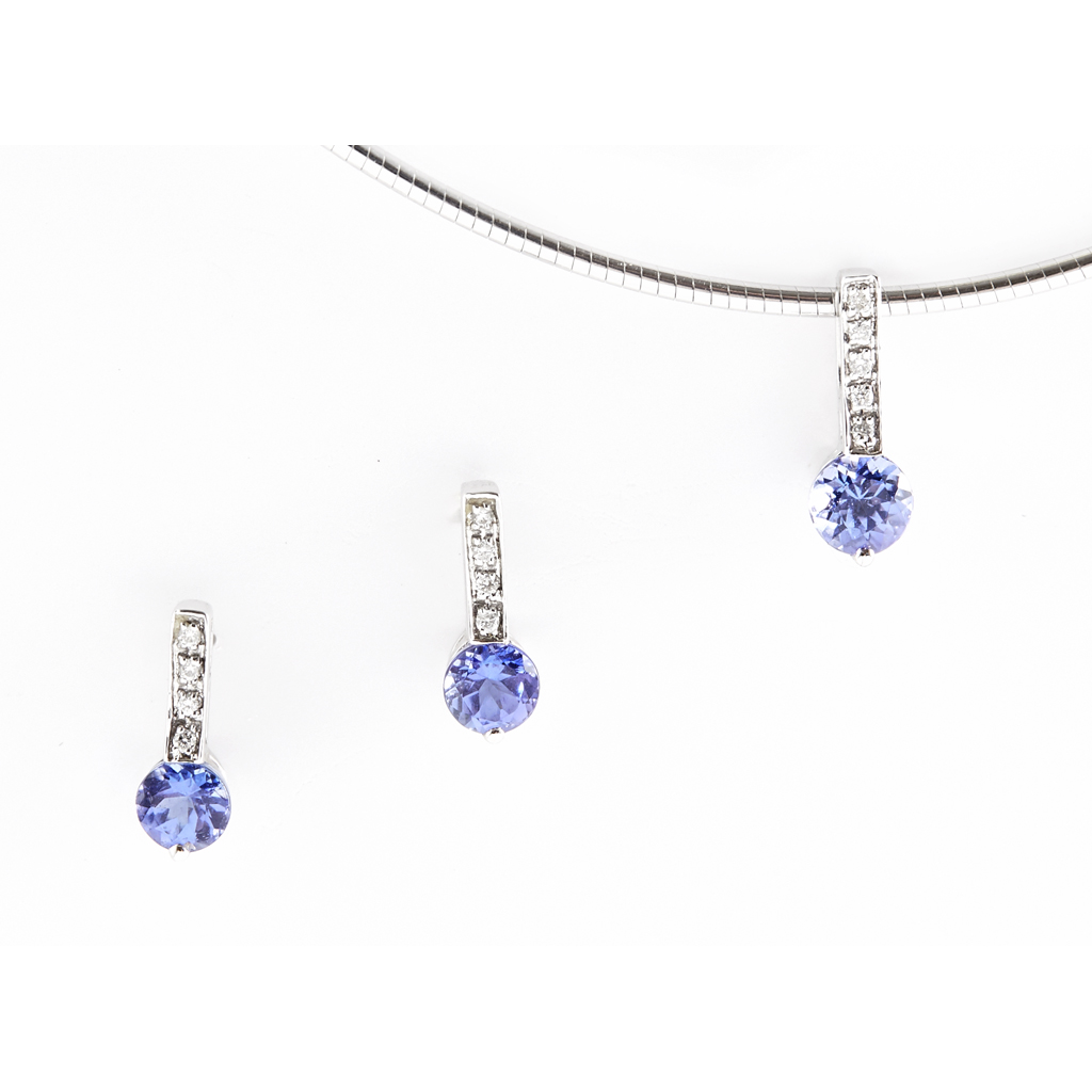 Appraisal: A Tanzanite and diamond set pendant necklace and matching earrings