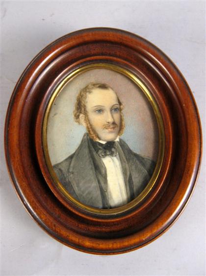 Appraisal: Victorian watercolor portrait of a young man In an oval