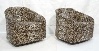 Appraisal: Pr Cheetah Print Lounge Chairs Swivel Hidden metal leg base