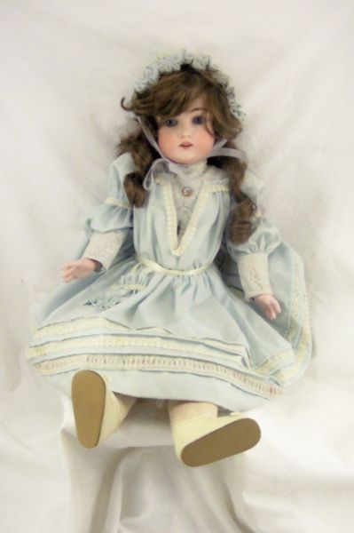 Appraisal: German Bisque Head Doll Bisque head doll with open mouth