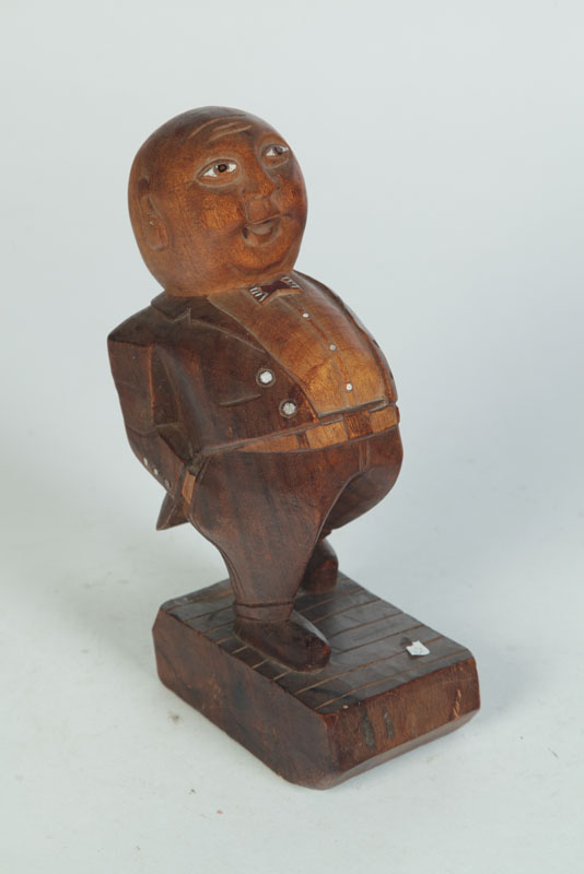 Appraisal: FOLK ART CARVING OF A MAN American early th century