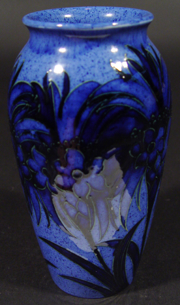 Appraisal: Moorcroft cornflower baluster vase hand painted and tubelined with blue