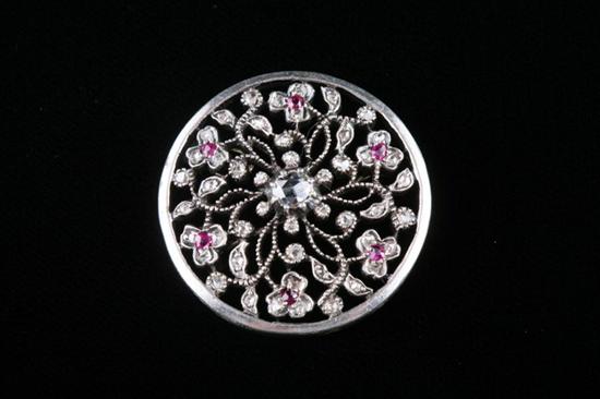 Appraisal: K YELLOW GOLD SILVER RUBY AND DIAMOND BROOCH PENDANT early