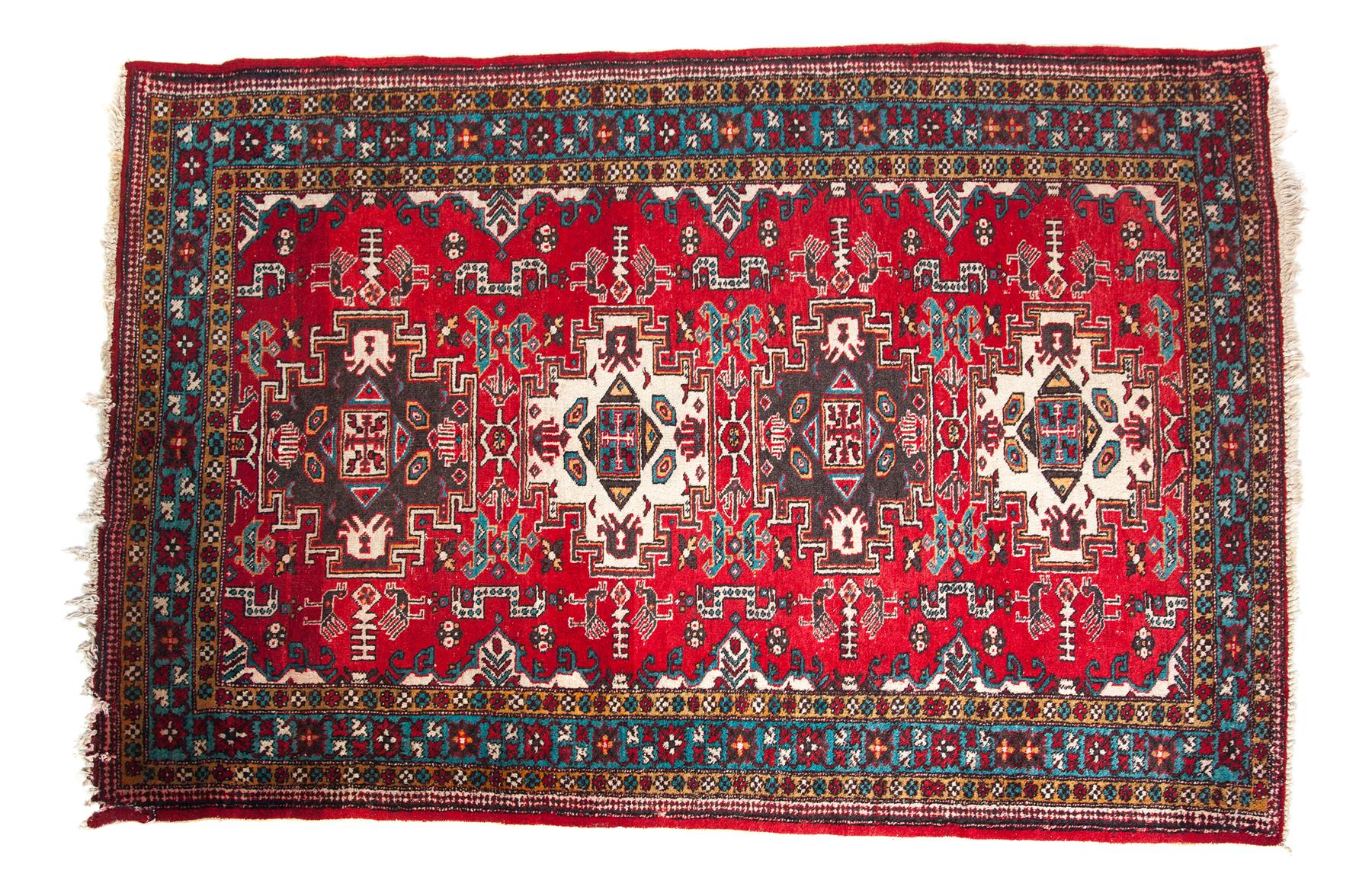 Appraisal: PERSIAN TRIBAL AREA RUG Twentieth century Red field with geometric