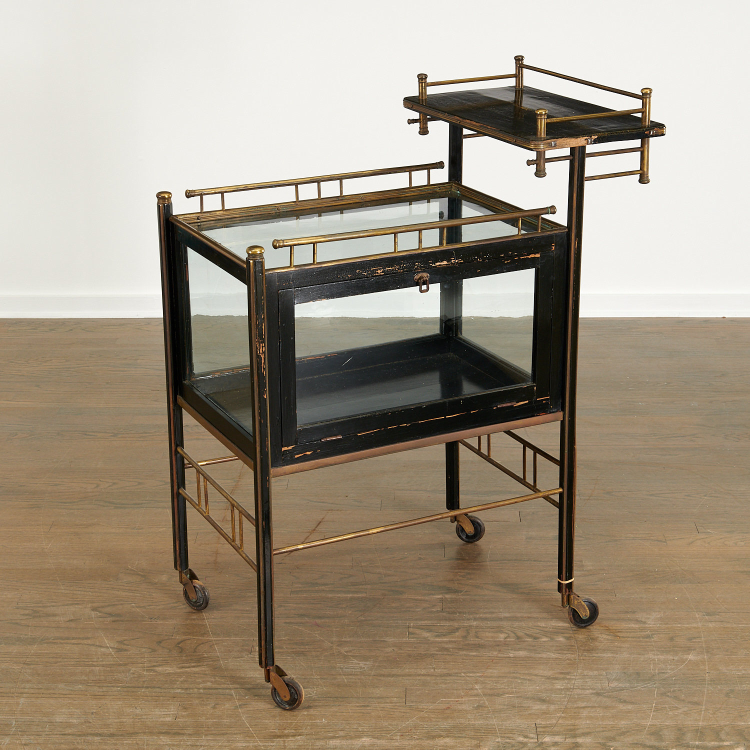 Appraisal: ERNST ROCKHAUSAN ATTRIB TIERED SERVING CART c Germany lacquered wood