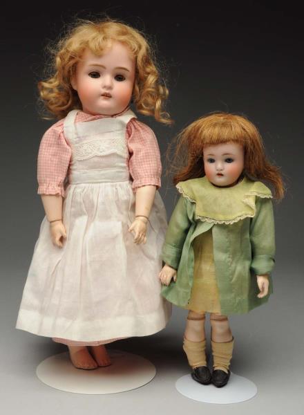 Appraisal: Lot Of German Child Dolls Both with bisque socket heads