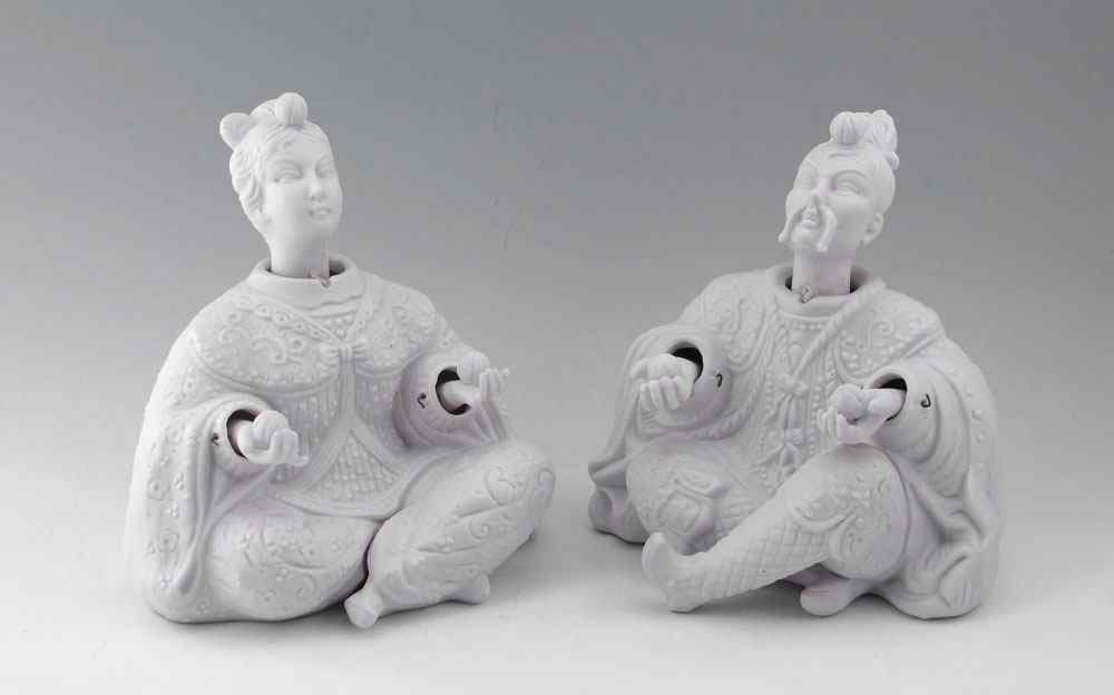 Appraisal: PAIR OF BISQUE NODDERS Japanese figures man and woman holding