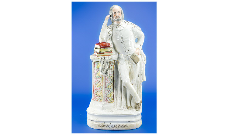 Appraisal: Nineteenth Century Staffordshire Figure of William Shakespeare standing cross legged