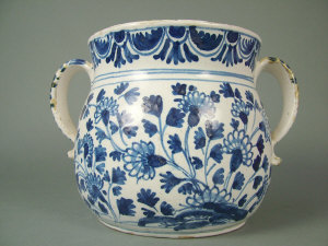 Appraisal: Delft blue and white posset pot and cover with twin