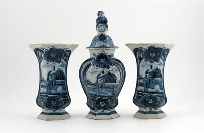 Appraisal: A Dutch Delft garniture of two hexagonal flared vases and