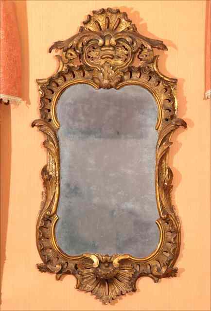 Appraisal: AN TH CENTURY GILT AND GESSO MIRROR of cartouche form