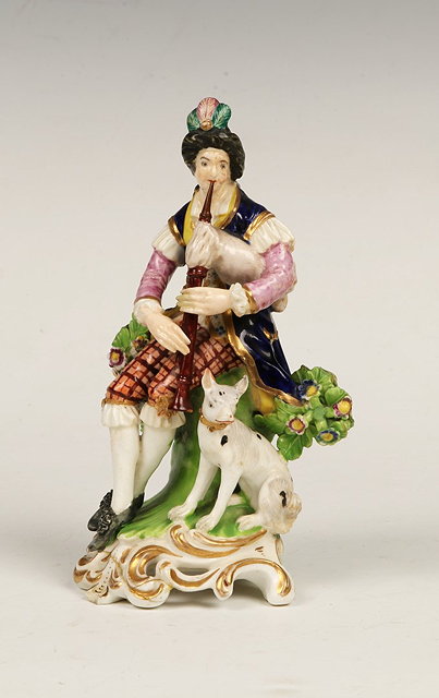 Appraisal: AN TH CENTURY DERBY PORCELAIN FIGURE of a bagpipe player