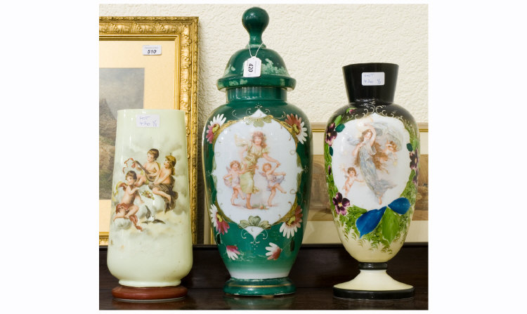 Appraisal: Three Victorian Opaline Glass Vases Painted Cherubs Amongst Floral Decoration