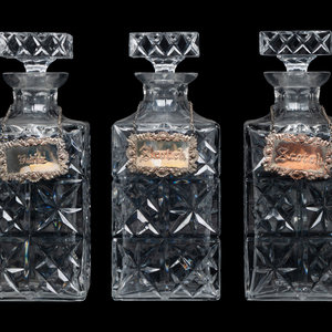 Appraisal: Three Cut Glass Decanters with liquor tags marked for Scotch