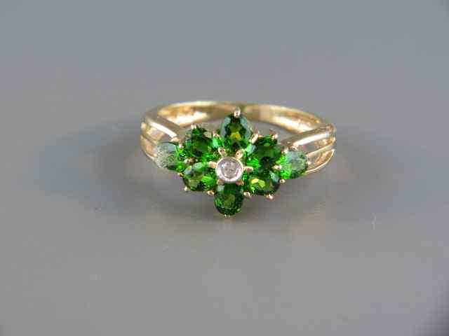 Appraisal: Tsavorite Garnet Ring vivid round gems with diamond in floral