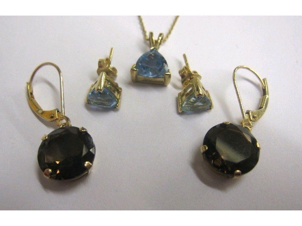 Appraisal: Lot comprising ct gold mounted blue topaz pendant with matching