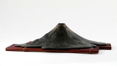 Appraisal: A Japanese bronze model of Mount Fuji the peak detailed