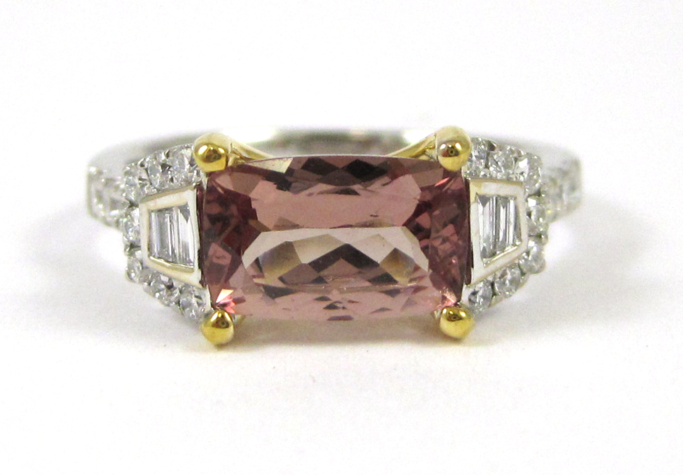 Appraisal: HESSONITE GARNET AND EIGHTEEN KARAT GOLD RING The white and