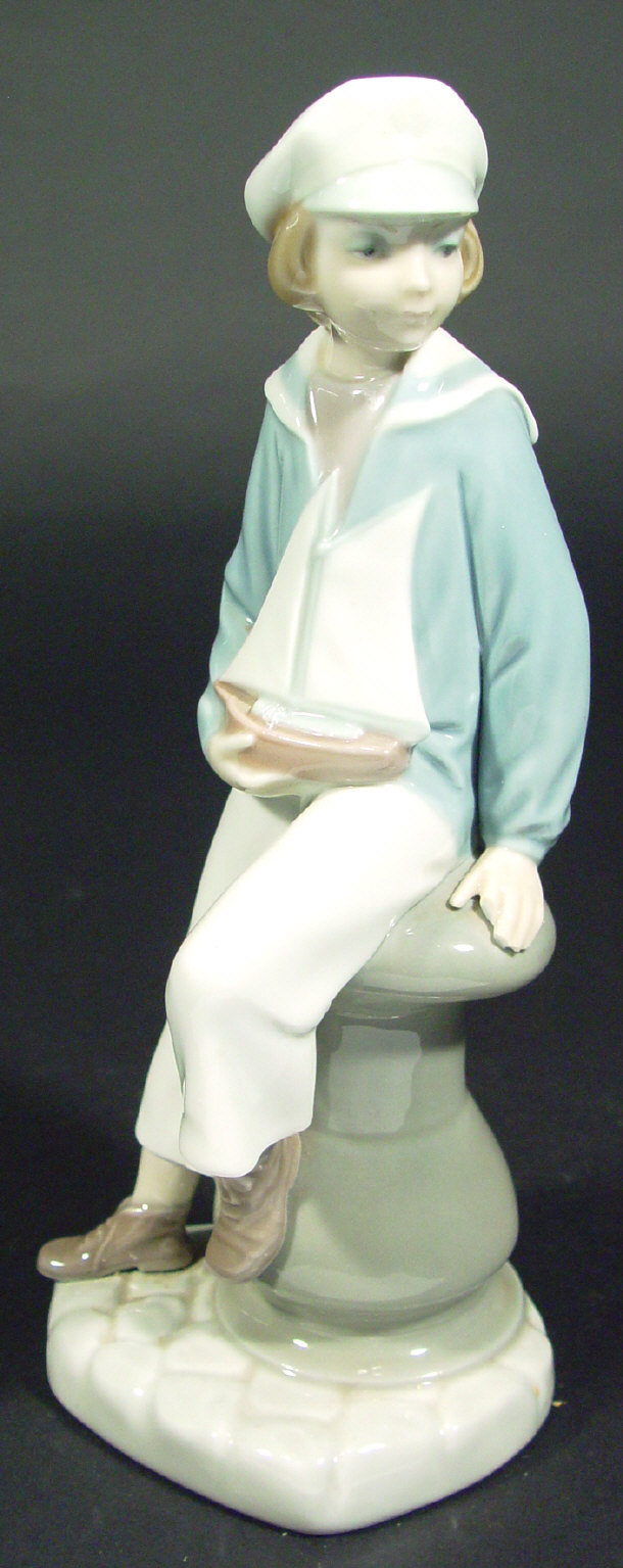 Appraisal: Lladro porcelain figure 'Boy with Yacht' printed and impressed factory