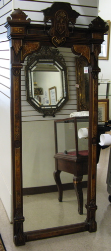 Appraisal: A VICTORIAN WALNUT-FRAMED PIER MIRROR Eastlake design American c -