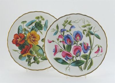 Appraisal: A pair of bone china botanical plates and a matching