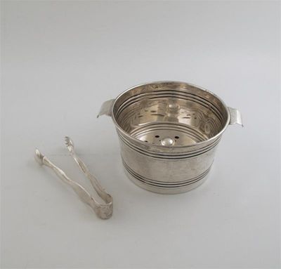 Appraisal: A th century Peruvian ice pail with pierced strainer and