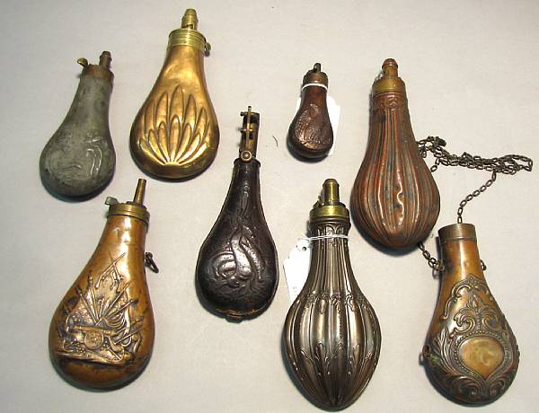 Appraisal: A lot of seven th century powder flasks and one