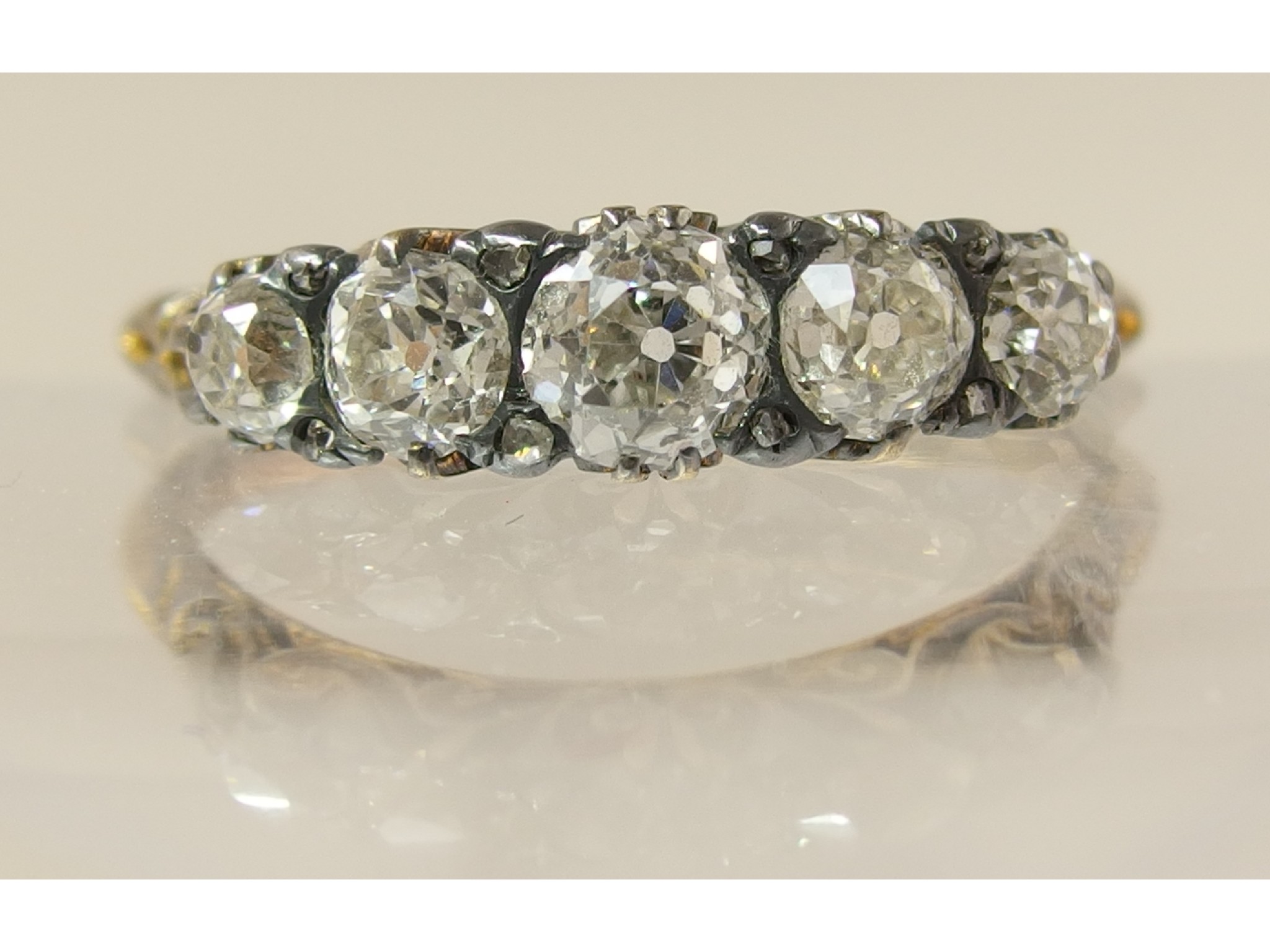 Appraisal: An ct gold five stone old cut diamond ringset to