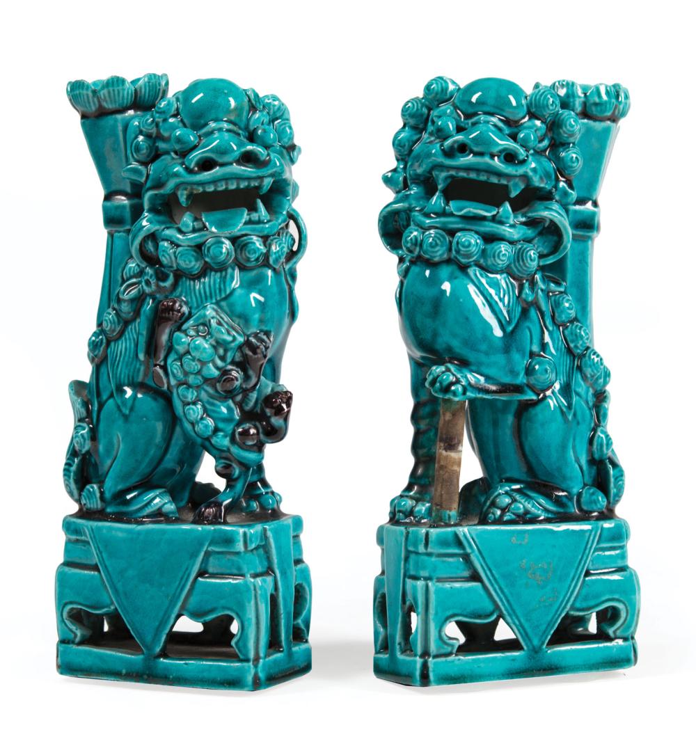 Appraisal: Pair of Chinese Export Turquoise and Aubergine Glazed Porcelain Buddhist