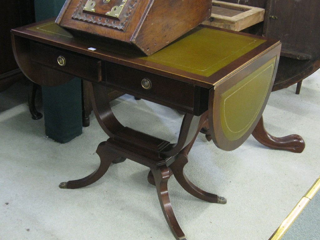 Appraisal: Reproduction sofa table with leather inserts